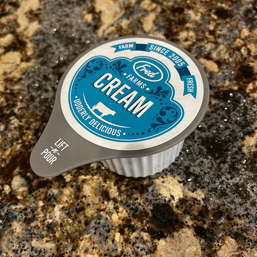 Ceramic cream container with lid